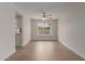 Dining room with hardwood floors and modern ceiling fan offers an inviting space at 16010 N 47Th Dr, Glendale, AZ 85306