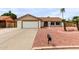 Charming single-story home with a two-car garage and desert landscaping at 16010 N 47Th Dr, Glendale, AZ 85306