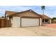 A well maintained single-story home showing the two-car garage at 16010 N 47Th Dr, Glendale, AZ 85306