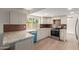 Kitchen boasts ample granite counters and stainless steel appliances at 16010 N 47Th Dr, Glendale, AZ 85306