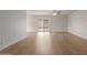 Spacious living room with sleek flooring and sliding glass doors to the backyard at 16010 N 47Th Dr, Glendale, AZ 85306