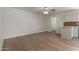 Living room leads to kitchen with hardwood floors and bright interiors at 16010 N 47Th Dr, Glendale, AZ 85306