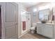 Stylish bathroom featuring a glass-enclosed shower, modern vanity, and a sleek design at 18159 W Piro St, Goodyear, AZ 85338