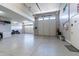 Extensive three car garage offering abundant space for vehicles, storage, and activities at 18159 W Piro St, Goodyear, AZ 85338