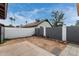 Large backyard enclosed by a fence, offering potential for landscaping and outdoor activities at 1818 S Toltec --, Mesa, AZ 85204