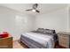 Cozy bedroom featuring neutral paint, luxury vinyl floors and a ceiling fan at 1818 S Toltec --, Mesa, AZ 85204
