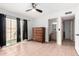 Bright bedroom with tile flooring and sliding glass doors leading to the backyard at 1818 S Toltec --, Mesa, AZ 85204