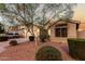 Beautifully landscaped home with desert landscaping and a two-car garage at 2123 S Bristol Dr, Mesa, AZ 85209