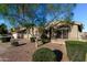 Home showing a tidy driveway and desert-style front yard landscaping at 2123 S Bristol Dr, Mesa, AZ 85209