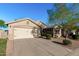 Attractive single-Gathering home with desert landscaping and a driveway at 2123 S Bristol Dr, Mesa, AZ 85209