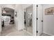 Hallway with mirrored closet doors leading to the bedroom and bathroom at 2123 S Bristol Dr, Mesa, AZ 85209