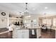 Open concept kitchen overlooking the living and dining areas, with a center island at 2123 S Bristol Dr, Mesa, AZ 85209