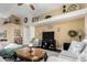 Cozy living area showcasing high shelving, modern decor, and comfortable seating arrangements at 2123 S Bristol Dr, Mesa, AZ 85209