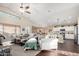 Spacious living room with an open floor plan, hardwood floors, and abundant natural light at 2123 S Bristol Dr, Mesa, AZ 85209