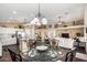 Open-concept space featuring a kitchen, dining area, and living room, perfect for entertaining at 2123 S Bristol Dr, Mesa, AZ 85209
