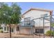 This expansive backyard includes a raised deck and swing set, creating an inviting outdoor space at 2257 E Lockwood St, Mesa, AZ 85213
