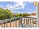 This inviting balcony offers peaceful outdoor space and views of the surrounding lush greenery and neighborhood at 2257 E Lockwood St, Mesa, AZ 85213