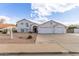 Inviting single-Gathering home with a three-car garage and a well-manicured front yard at 2257 E Lockwood St, Mesa, AZ 85213