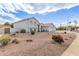 Charming two-story home with a well-maintained desert landscaped front yard and inviting curb appeal at 2257 E Lockwood St, Mesa, AZ 85213