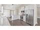 Bright, spacious kitchen features stainless steel appliances and granite countertops at 2257 E Lockwood St, Mesa, AZ 85213