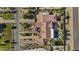An aerial view showing an expansive yard with a sparkling pool, water feature, putting green and private backyard oasis at 24695 S 195Th Way, Queen Creek, AZ 85142