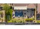 Backyard oasis boasts sparkling pool, spa, putting green, patio and lush landscaping offering the ultimate outdoor experience at 24695 S 195Th Way, Queen Creek, AZ 85142