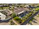 Aerial view of a property highlighting a backyard oasis with a pool, lush landscaping, and ample outdoor space at 24695 S 195Th Way, Queen Creek, AZ 85142
