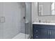 Modern bathroom features a sleek glass shower, a vanity with a stylish countertop and a decorative backsplash at 24695 S 195Th Way, Queen Creek, AZ 85142