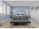 Charming bedroom has neutral walls and a comfortable seating area at 24695 S 195Th Way, Queen Creek, AZ 85142