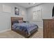A bedroom with carpeted floors, a comfortable bed, and ample space at 24695 S 195Th Way, Queen Creek, AZ 85142