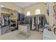 Spacious walk-in closet with ample storage and organizational spaces including custom shelving at 24695 S 195Th Way, Queen Creek, AZ 85142