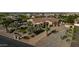 Beautiful home featuring meticulous landscaping and stone accents creating an inviting curb appeal and grand entry at 24695 S 195Th Way, Queen Creek, AZ 85142