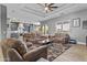 Spacious living room shows open floor plan to kitchen and dining areas at 24695 S 195Th Way, Queen Creek, AZ 85142