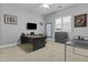 Office space features a window, carpeted floor, a sleek desk, and a white board at 24695 S 195Th Way, Queen Creek, AZ 85142