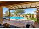 Backyard pool featuring a water feature and lounge chairs at 25862 N 108Th Ave, Peoria, AZ 85383