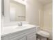 This bathroom features a vanity with a sink, toilet, and shower-tub combo at 27 W Concorda Dr # 104, Tempe, AZ 85282