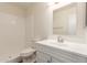 Bathroom featuring a tiled shower/tub combo, vanity, mirror and neutral color scheme at 27 W Concorda Dr # 104, Tempe, AZ 85282