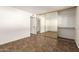 Bedroom showcasing a mirrored closet, neutral walls, and tile flooring at 27 W Concorda Dr # 104, Tempe, AZ 85282