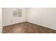This bright bedroom features a window and tile flooring at 27 W Concorda Dr # 104, Tempe, AZ 85282