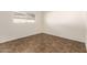 Bedroom space with tile flooring, a window, and ample natural light at 27 W Concorda Dr # 104, Tempe, AZ 85282