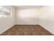 A bedroom featuring tile flooring and a window with blinds at 27 W Concorda Dr # 104, Tempe, AZ 85282