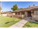 Charming single-story brick home with a well-maintained front lawn and cozy entrance at 27 W Concorda Dr # 104, Tempe, AZ 85282