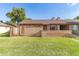 Charming single-story brick home with a well-maintained front lawn and cozy entrance at 27 W Concorda Dr # 104, Tempe, AZ 85282