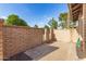 Private brick-walled patio, perfect for outdoor entertaining and relaxing at 27 W Concorda Dr # 104, Tempe, AZ 85282