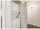 This laundry room features a stacked washer and dryer at 27 W Concorda Dr # 104, Tempe, AZ 85282