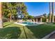 Enjoy the community pool with lush landscaping and shade at 27 W Concorda Dr # 104, Tempe, AZ 85282