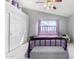 Bedroom featuring a vaulted ceiling, double closets, and an upholstered bench at 3017 W Matthew Dr, Phoenix, AZ 85027
