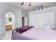 Bedroom view with a vaulted ceiling, double closets, and a doorway to an ensuite bathroom at 3017 W Matthew Dr, Phoenix, AZ 85027