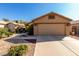 Charming single-story home with a well-maintained front yard and a two-car garage at 3017 W Matthew Dr, Phoenix, AZ 85027