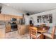 Cozy eat-in kitchen featuring stainless steel appliances, and an island at 3017 W Matthew Dr, Phoenix, AZ 85027